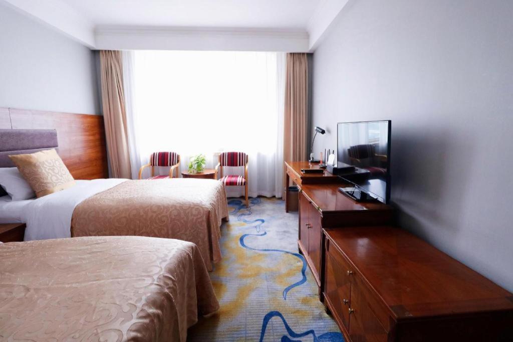 Qingdao Royal Garden Hotel Esterno foto
